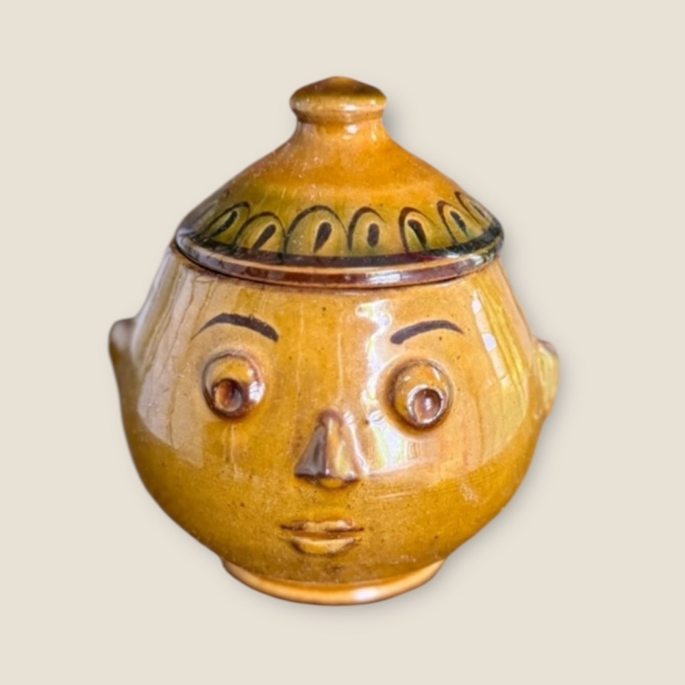 Handcrafted Brown Ceramic Face Jar